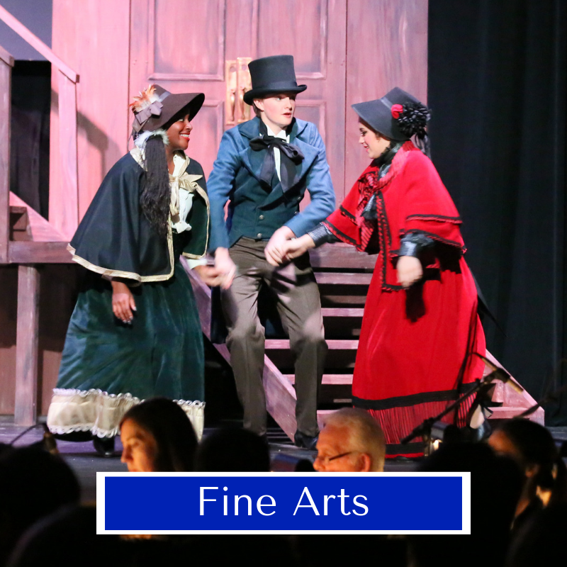 Photo of three students in the high school musical production of "A Christmas Carol"