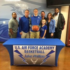 Jake Phillips with family, Coaches Phillips, Biddle, and Bennett, and LCCS A.D. Wade Whites